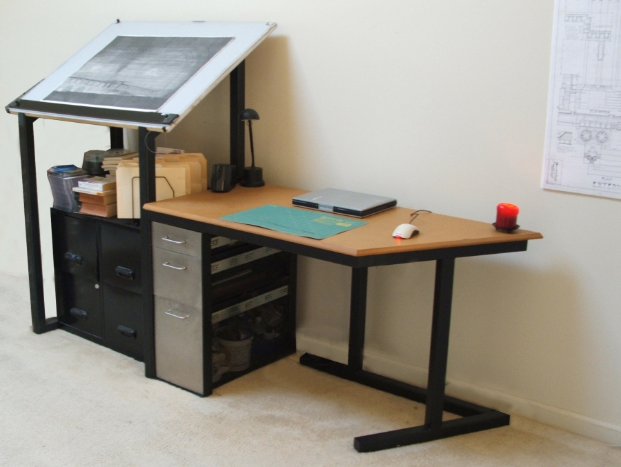 My desk. Steel frame, rigidized stainless steel + perforated drawers, MDF top.